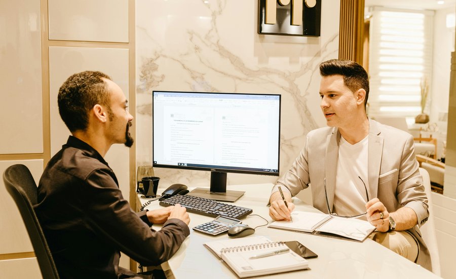 ROK Financial advisor meeting with small business owner to discuss loan options